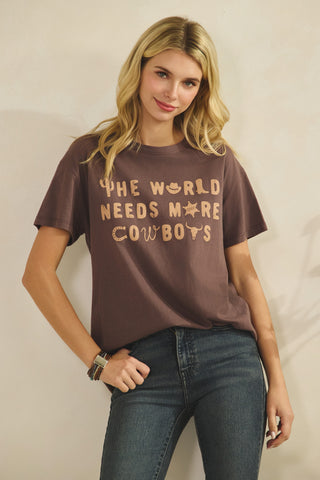 The World Needs More Cowboys Brown Graphic Tee