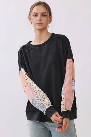 Curvy Contrast Raglan Mixed Media Sweatshirt in black with patchwork sleeves