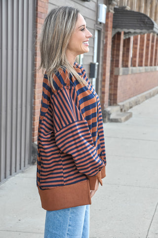 Layer up in this easy-going mixed stripe pullover sweatshirt — a cozy essential with contrast panel detailing and ribbed trim that gives it that polished, put-together look without any extra effort.