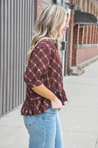 Allover plaid pattern with subtle metallic accents.