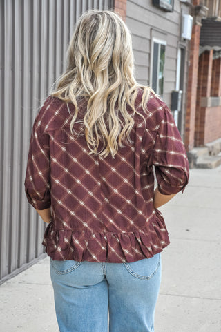 Allover plaid pattern with subtle metallic accents.