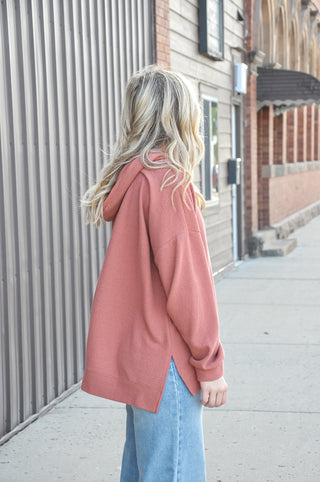Available in black, blue, mauve, or denim, this ultra-soft hoodie features a relaxed silhouette that makes it an easy go-to piece for casual days, lounging, or layering through every season.