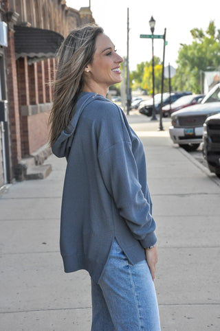 Available in black, blue, mauve, or denim, this ultra-soft hoodie features a relaxed silhouette that makes it an easy go-to piece for casual days, lounging, or layering through every season.