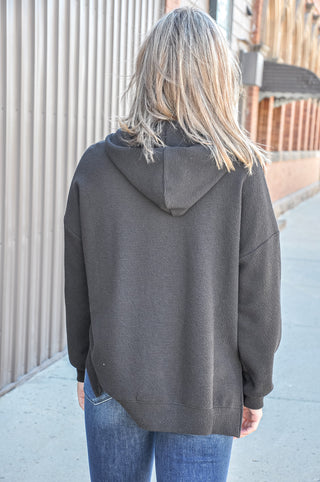 Available in black, blue, mauve, or denim, this ultra-soft hoodie features a relaxed silhouette that makes it an easy go-to piece for casual days, lounging, or layering through every season