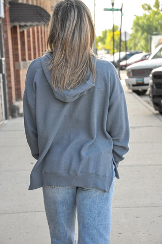 Available in black, blue, mauve, or denim, this ultra-soft hoodie features a relaxed silhouette that makes it an easy go-to piece for casual days, lounging, or layering through every season.