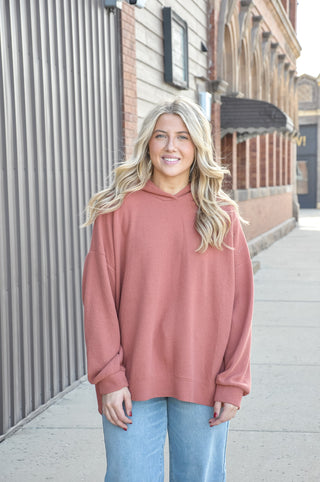 Available in black, blue, mauve, or denim, this ultra-soft hoodie features a relaxed silhouette that makes it an easy go-to piece for casual days, lounging, or layering through every season.