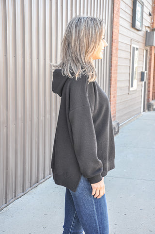 Available in black, blue, mauve, or denim, this ultra-soft hoodie features a relaxed silhouette that makes it an easy go-to piece for casual days, lounging, or layering through every season.