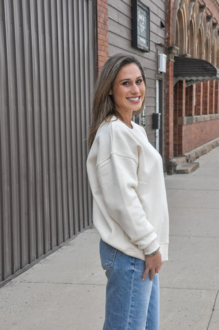 This cream graphic sweatshirt features a bold "Quack Off" design with a nod to duck hunting culture — equal parts humor and laid-back outdoor style. Cozy fabric and a relaxed fit make it the perfect off-season staple for anyone who lives for early mornings in the blind.