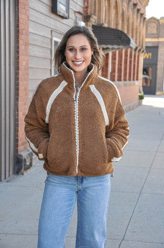 The Crochet Trim Zip Front Sherpa Fleece Jacket in Brown/Cream is the perfect cozy layer with a cute, elevated twist. 