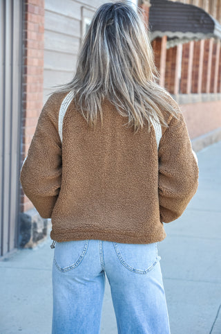 The Crochet Trim Zip Front Sherpa Fleece Jacket in Brown/Cream is the perfect cozy layer with a cute, elevated twist. 