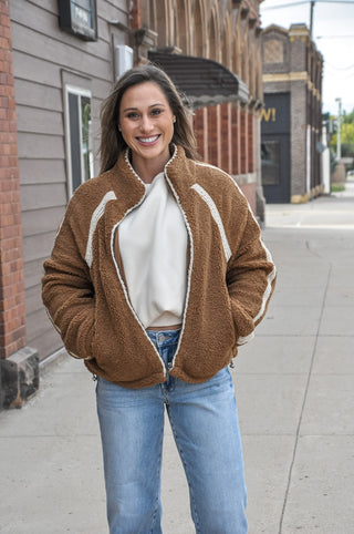 The Crochet Trim Zip Front Sherpa Fleece Jacket in Brown/Cream is the perfect cozy layer with a cute, elevated twist. 