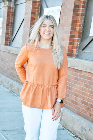 Textured Mid Sleeve Peplum Top