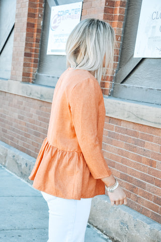 Textured Mid Sleeve Peplum Top