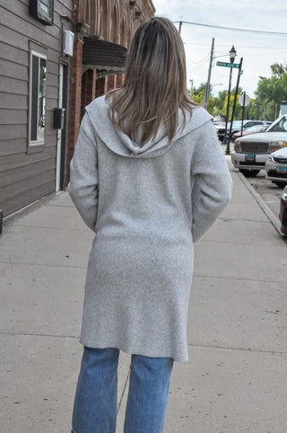 Hooded design for added warmth and casual style.  Open-front silhouette — easy to layer over any outfit.