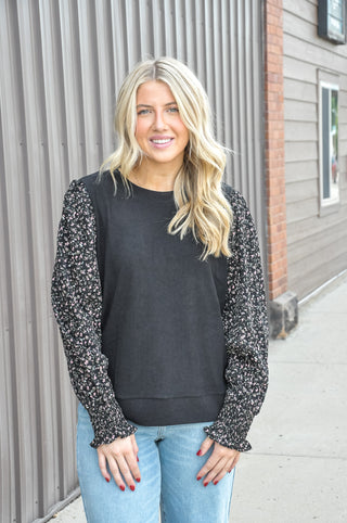  The Knit Mix Floral Top by Staccato is crafted in a soft knit construction with beautiful floral mixed-fabric accents that add texture and charm without trying too hard. 
