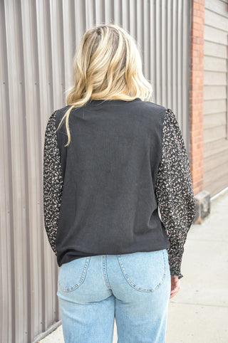  The Knit Mix Floral Top by Staccato is crafted in a soft knit construction with beautiful floral mixed-fabric accents that add texture and charm without trying too hard. 