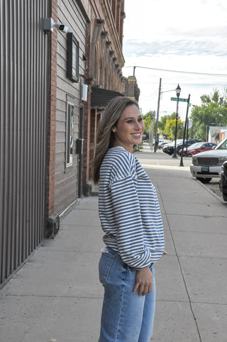 The loose fit and crew neckline keep it relaxed, while the center cut edge detail adds a subtle, elevated touch that sets it apart from your basic sweatshirt.