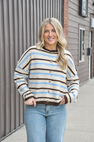 Two looks, one cardigan. This multi-stripe knit cardigan features a reversible design that gives you twice the styling options — wear it as a classic button-front cardigan or flip it for a crew neck pullover look, depending on your mood. 