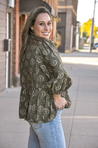 Olive Ornate Print Ruffle Tie-Neck Babydoll Tunic Top, view 2 | JQ Clothing Co.