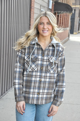  This brushed plaid button-down layers effortlessly over any look, with a terry drawstring hoodie and flap pockets that make it as functional as it is stylish. 