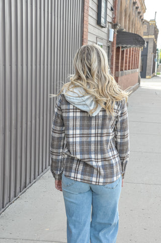  This brushed plaid button-down layers effortlessly over any look, with a terry drawstring hoodie and flap pockets that make it as functional as it is stylish. 