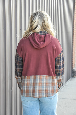 This micro brushed drawstring hoodie top is the perfect mix of cozy and cool, featuring plaid-inserted sleeves that give it that effortless mix-media charm.