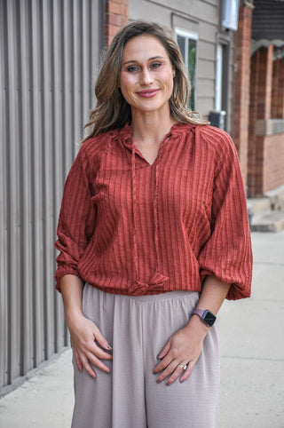 Rust Textured Tie-Neck Balloon Sleeve Raglan Blouse