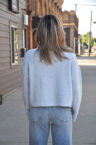 Bright, cheerful, and full of personality, the Stand Color Sweater Cardigan with Colorful Buttons is the perfect way to add a playful touch to your wardrobe. 