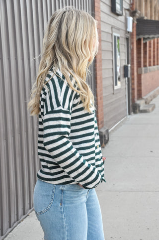 This striped button-down sweater cardigan in forest green and cream.