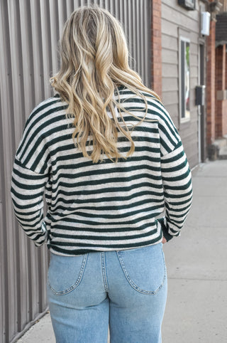 This striped button-down sweater cardigan in forest green and cream.