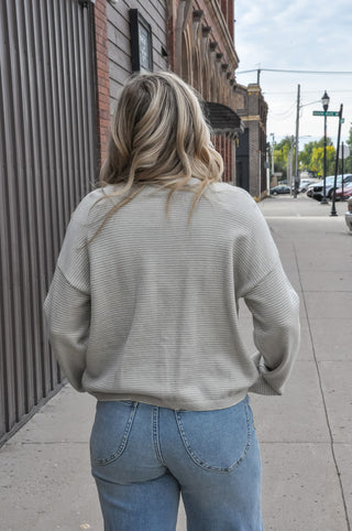 This textured stripe button-down crew neck cardigan in a soft taupe/sage is the kind of layering piece you'll reach for all season long.